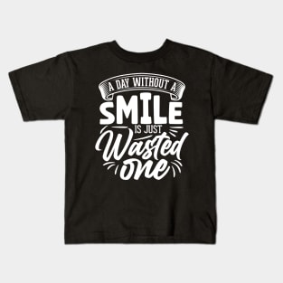 A day without a smile is just wasted one Kids T-Shirt